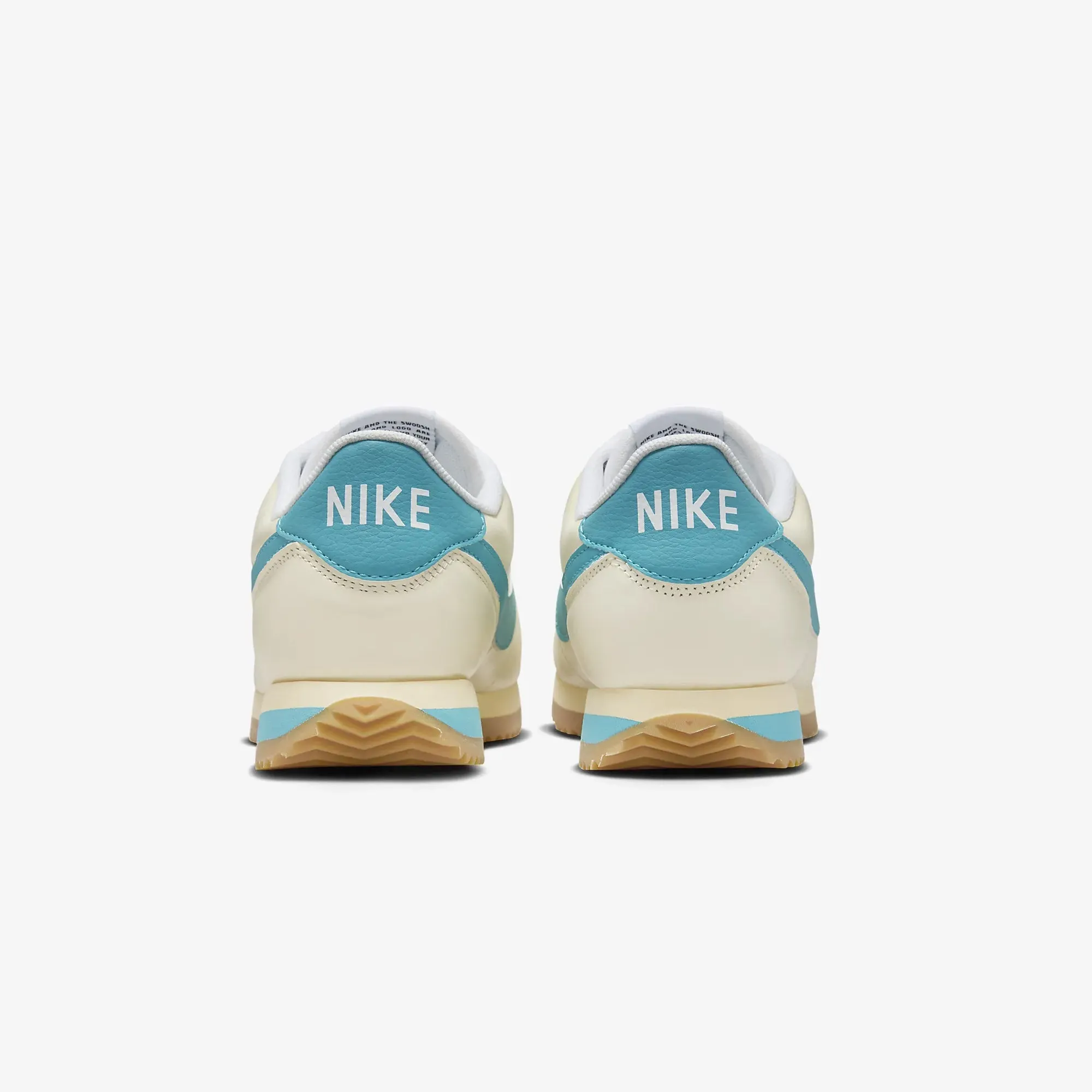 Nike | WMN'S CORTEZ TXT  { COCONUT MILK/TEAL NEBULA-GUM YELLOW